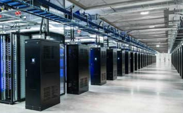 A row of servers in a large room.