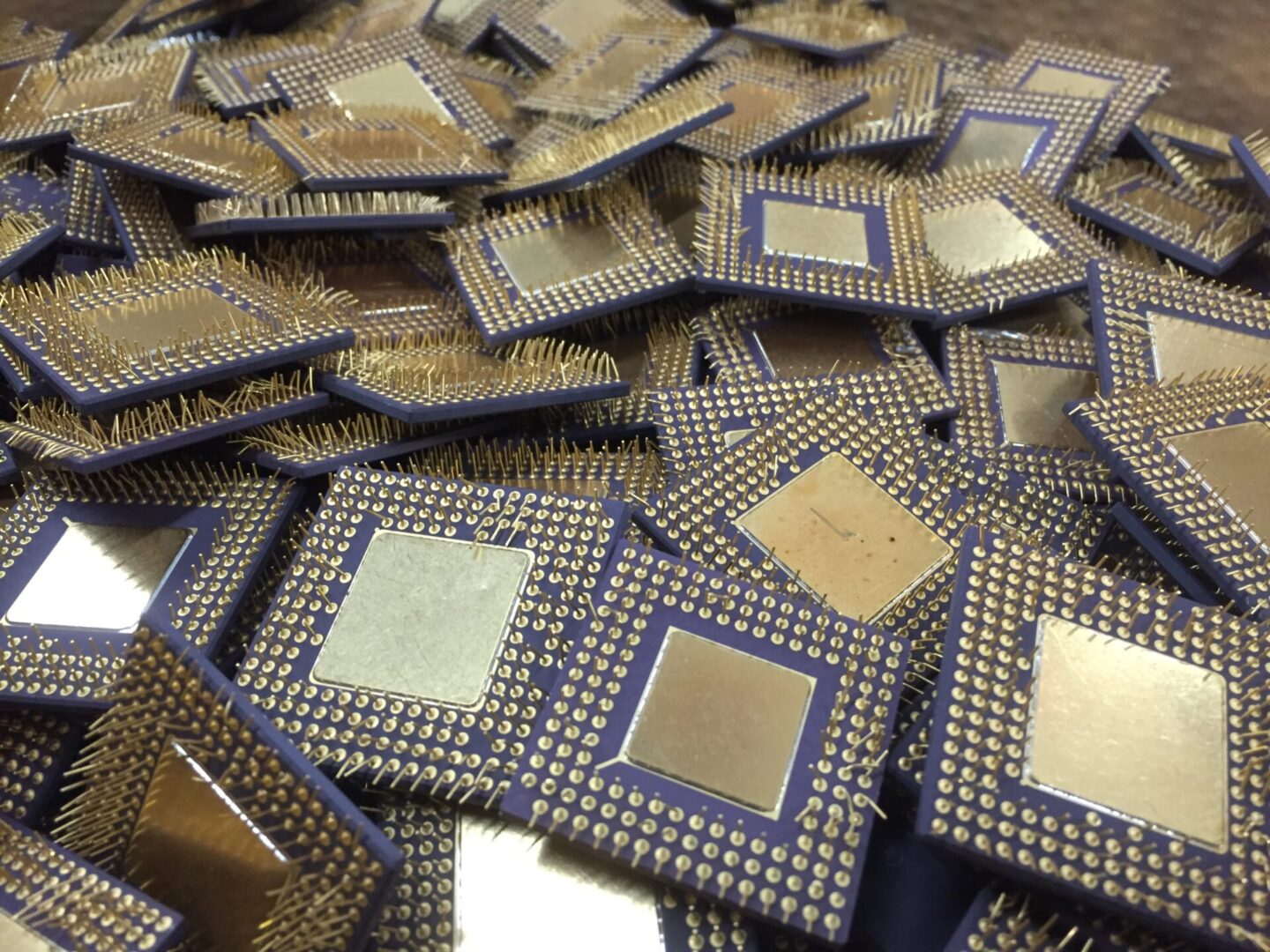 A pile of computer chips sitting on top of each other.